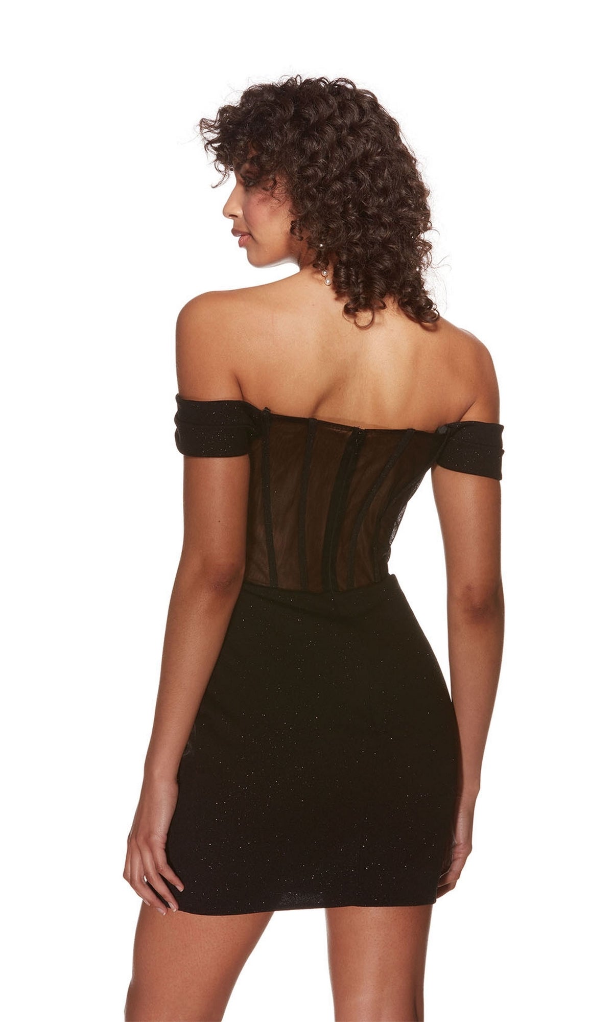 A woman with curly hair models the Alyce Off-Shoulder Short Glitter Hoco Dress 4819, featuring a sheer back panel, as she faces away from the camera against a white background.